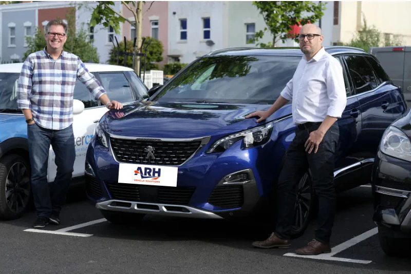 Andy Hook and a client with a Peugeot supplied by ARH
